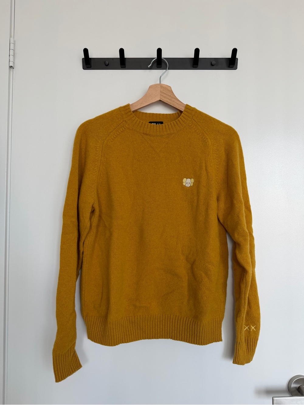 Uniqlo x KAWS Women’s Crewneck Sweater in Mustard Yellow